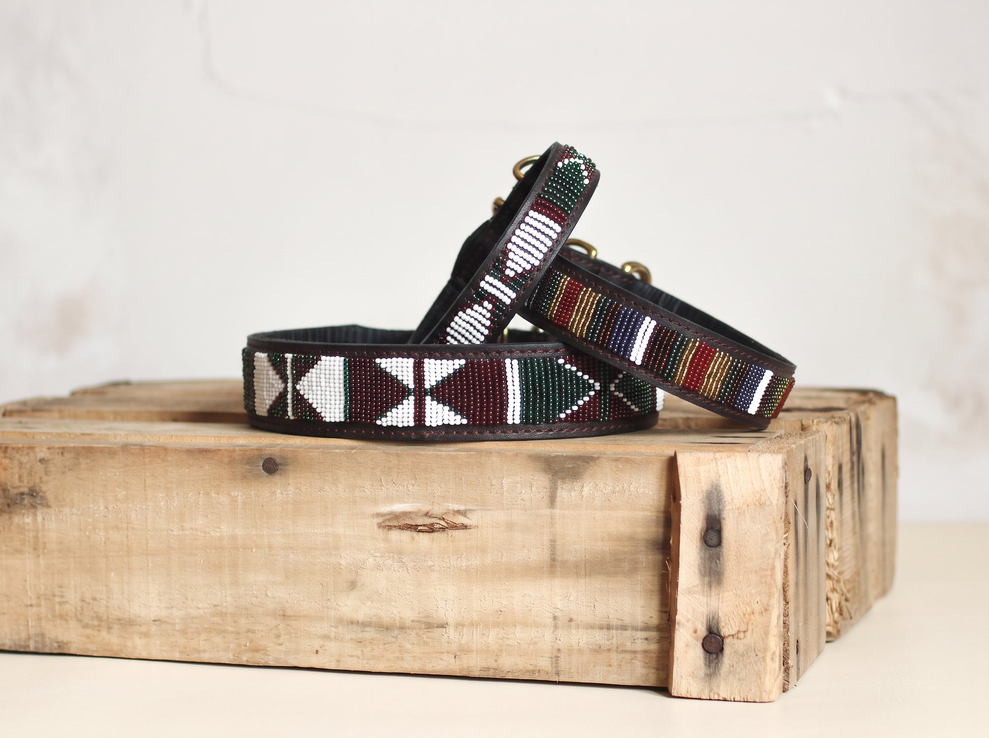 AMAZON beaded dog collar by COLLART on wooden crate