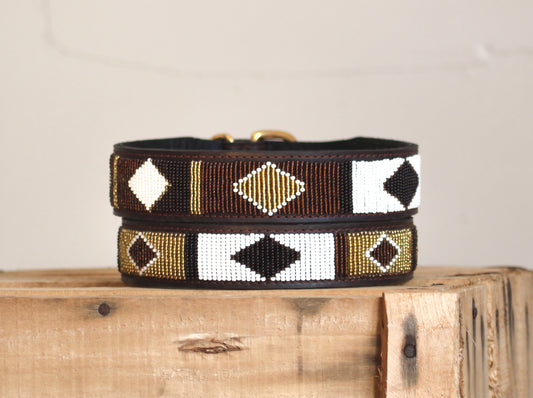SIOUX beaded dog collar by COLLART on wooden crate